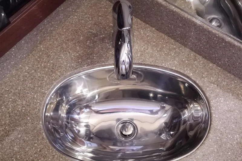 Slide: The Image of Stainless steel sink and faucet on American Tug 395, 2013 model. - 95