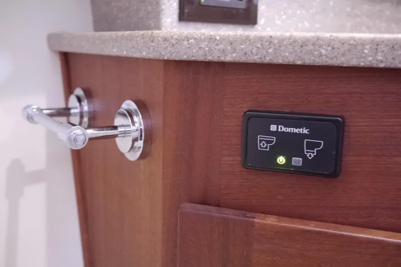 Slide: The Image of Control panel and towel holder on 2013 American Tug 395 yacht interior. - 96