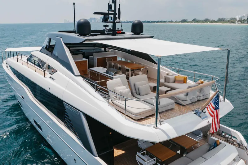 Slide: The Image of Luxurious 2024 Sanlorenzo SL90A yacht with spacious deck and elegant seating on the ocean. - 14
