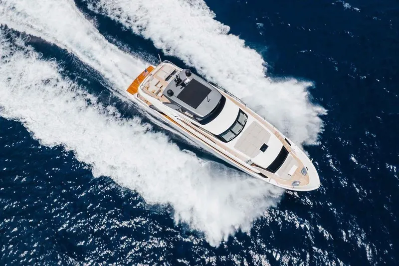 Slide: The Image of Aerial view of 2024 Sanlorenzo SL90A yacht cruising on open blue sea. - 4