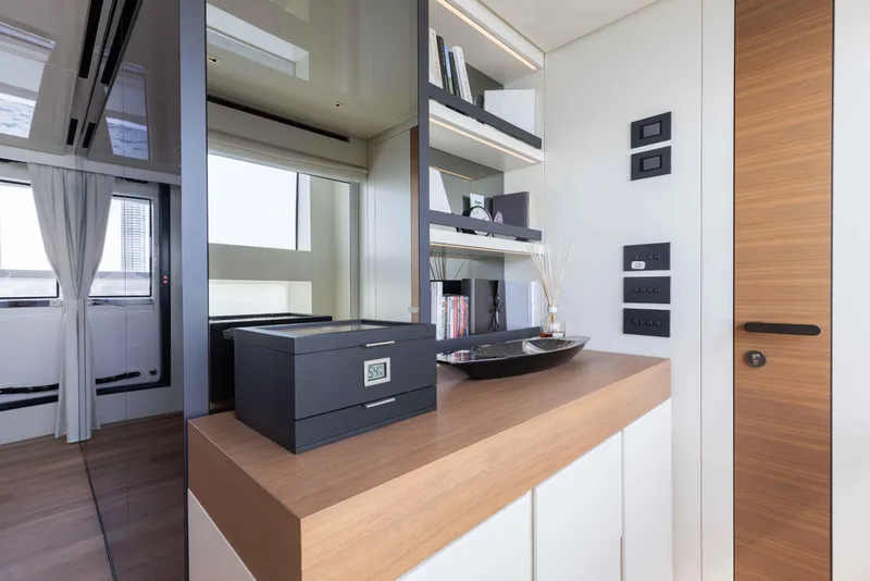 Slide: The Image of Luxurious interior of 2024 Sanlorenzo SL90A yacht with modern decor and wooden accents. - 40