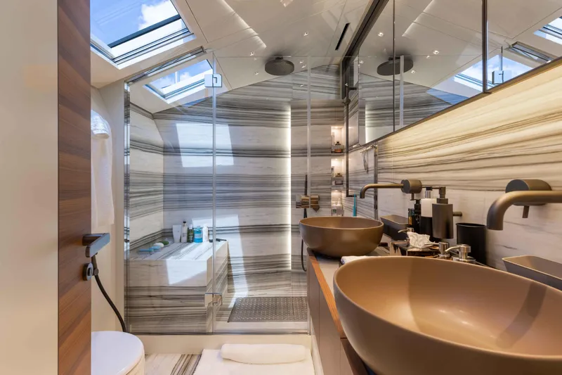 Slide: The Image of Luxurious bathroom on 2024 Sanlorenzo SL90A yacht with modern fixtures and elegant design. - 42