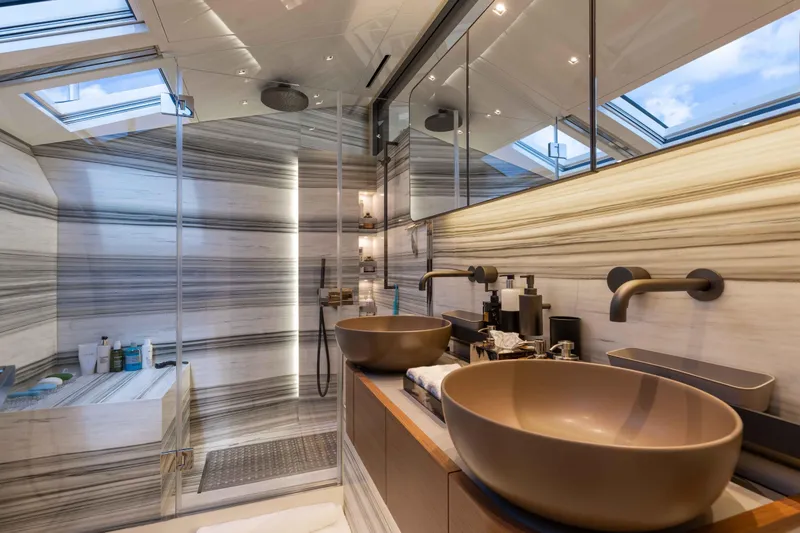 Slide: The Image of Luxurious bathroom in 2024 Sanlorenzo SL90A yacht with modern fixtures and elegant design. - 43