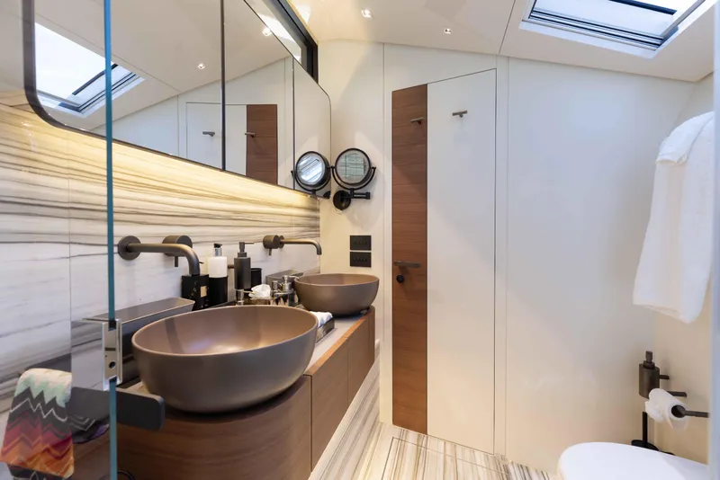 Slide: The Image of Luxurious bathroom in 2024 Sanlorenzo SL90A yacht with modern fixtures and elegant design. - 44