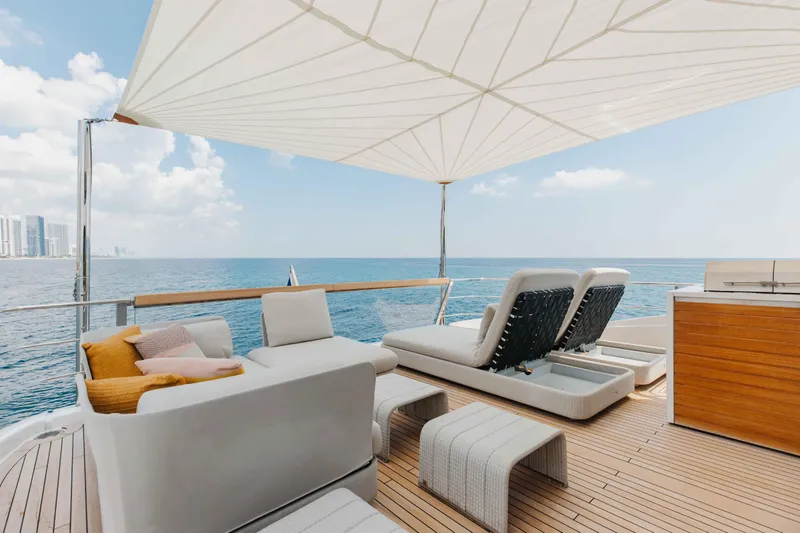 Slide: The Image of Luxurious 2024 Sanlorenzo SL90A yacht deck with lounge chairs and ocean view. - 66