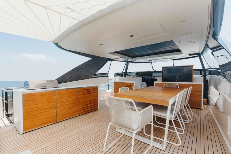 Slide: The Image of Luxurious 2024 Sanlorenzo SL90A yacht deck with dining area and modern amenities. - 72