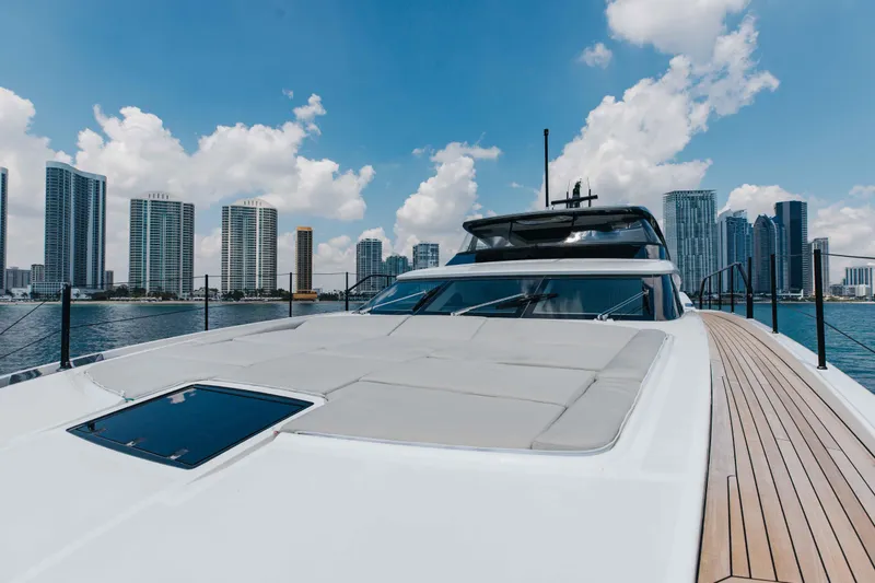Slide: The Image of 2024 Sanlorenzo SL90A yacht with city skyline and blue sky background. - 81