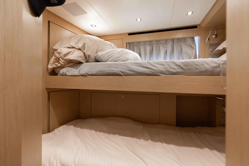 Slide: The Image of Luxurious 2024 Sanlorenzo SL90A yacht cabin with cozy bunk beds and modern lighting. - 88