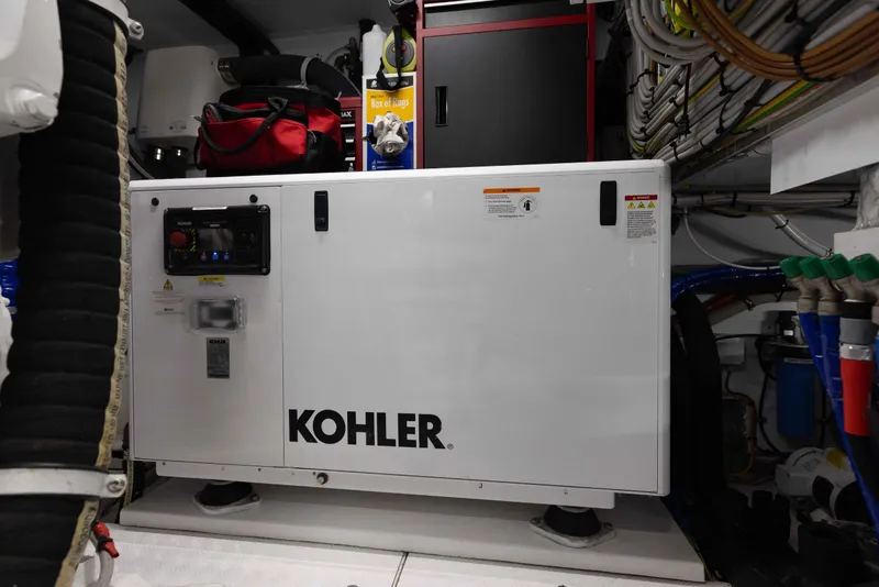 Slide: The Image of Engine room of 2024 Sanlorenzo SL90A yacht featuring a Kohler generator. - 91