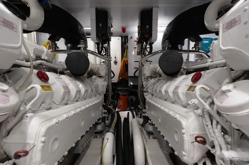 Slide: The Image of Engine room of 2024 Sanlorenzo SL90A yacht, featuring dual MAN engines. - 96