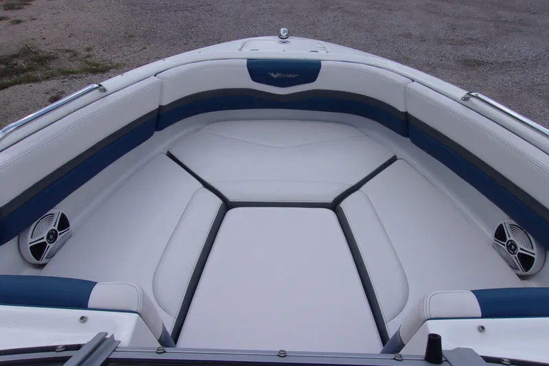 Slide: The Image of 2016 Chaparral Vortex 203 VR boat interior with white and blue seating. - 10
