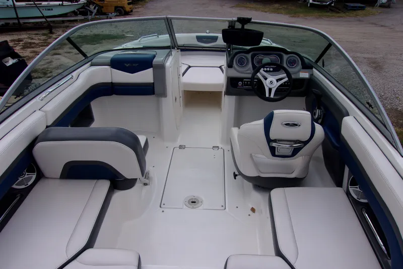 Slide: The Image of 2016 Chaparral Vortex 203 VR boat interior with white and blue seating. - 5