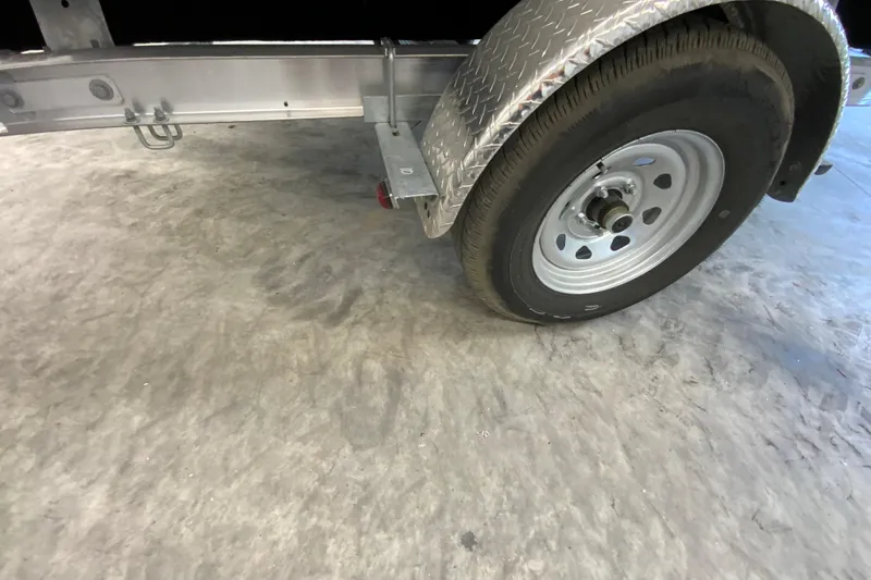 Slide: The Image of Trailer wheel and fender of a 2026 Gala V500 on concrete floor. - 15