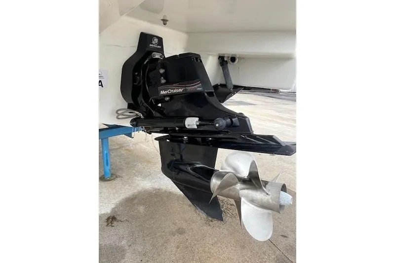 Slide: The Image of 2006 Formula 240 Bowrider with MerCruiser outdrive, showcasing propeller and stern details. - 19