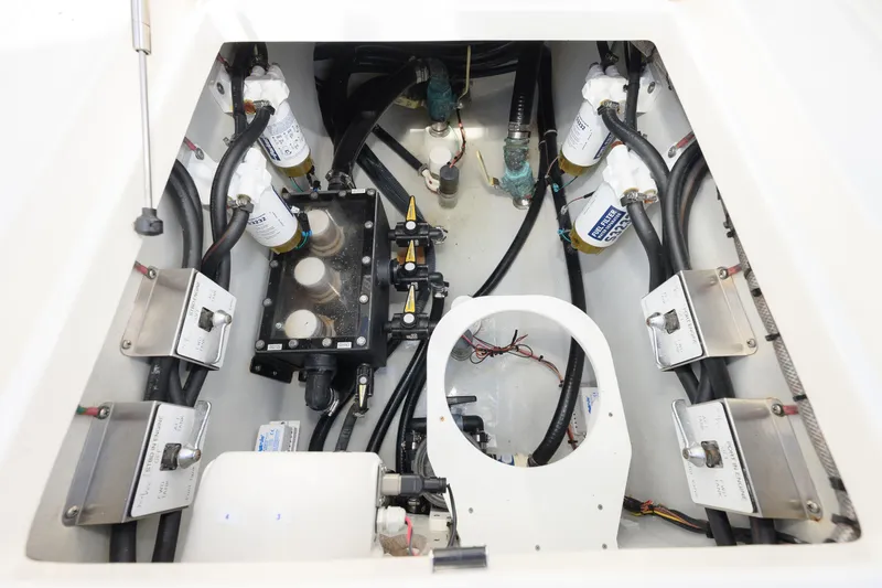 Slide: The Image of Engine compartment of 2021 SeaVee 390Z boat, showcasing fuel filters and wiring. - 13