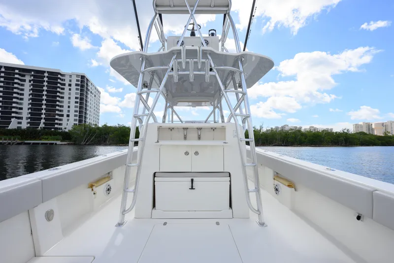 Slide: The Image of 2021 SeaVee 390Z boat interior with tower, cityscape, and blue sky background. - 7