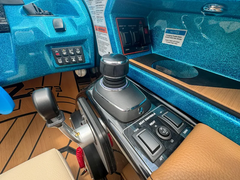 Slide: The Image of 2024 Varatti Z2373 boat control panel with joystick and switches. - 14