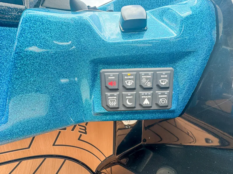 Slide: The Image of Control panel of 2024 Varatti Z2373 boat with various function buttons. - 16