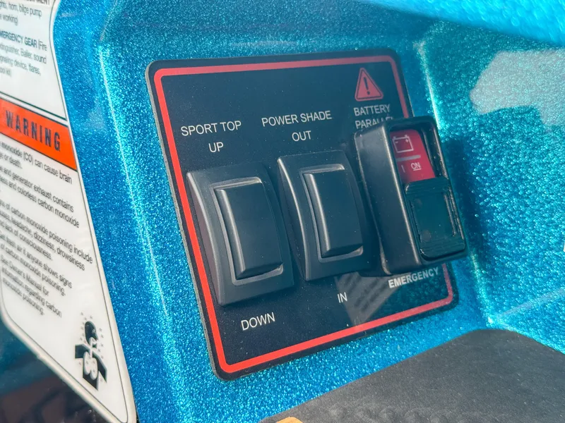Slide: The Image of Control panel of 2024 Varatti Z2373 boat with sport top and power shade switches. - 18