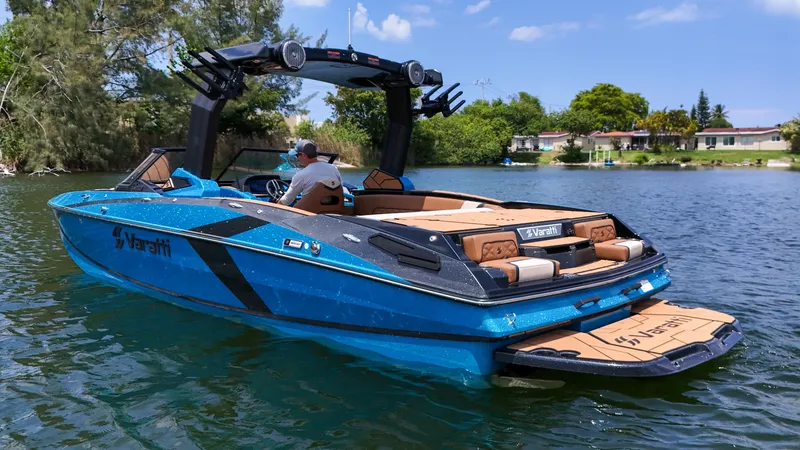 Slide: The Image of 2024 Varatti Z2373 boat cruising on a lake with passengers. - 2