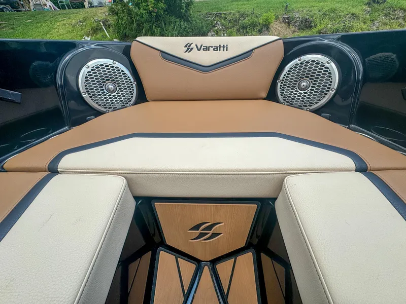 Slide: The Image of 2024 Varatti Z2373 boat interior with tan and black seating and built-in speakers. - 22