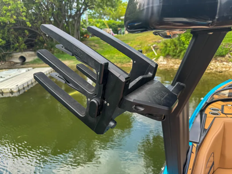 Slide: The Image of 2024 Varatti Z2373 wakeboard rack on a boat by a lake. - 33