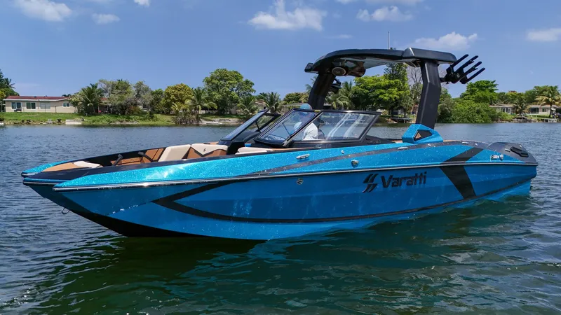 Slide: The Image of 2024 Varatti Z2373 boat on a lake with a blue exterior. - 9