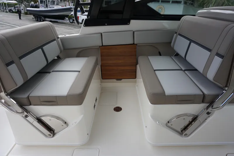 Slide: The Image of 2026 Boston Whaler 330 Vantage interior seating with modern design and comfortable upholstery. - 18