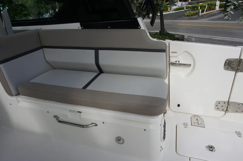 Slide: The Image of 2026 Boston Whaler 330 Vantage interior seating with sleek, modern design and durable materials. - 23