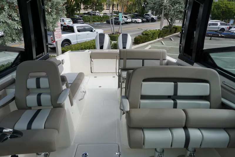 Slide: The Image of 2026 Boston Whaler 330 Vantage interior with luxurious seating and modern design. - 31