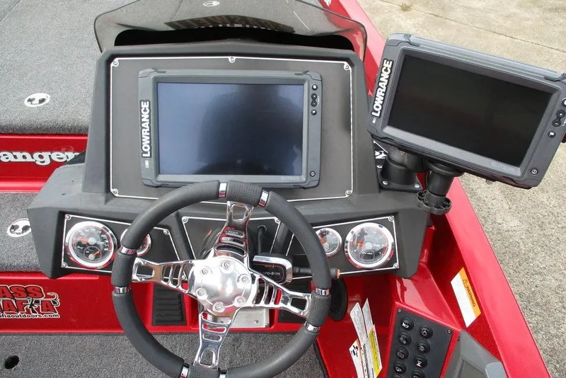 Slide: The Image of 2020 Ranger Z519 boat dashboard with Lowrance displays and steering wheel. - 12