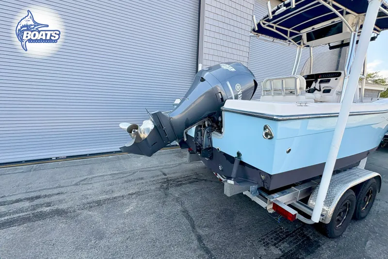 Slide: The Image of 2013 Grady-White Fisherman 209 boat on trailer, featuring Yamaha outboard motor. - 10