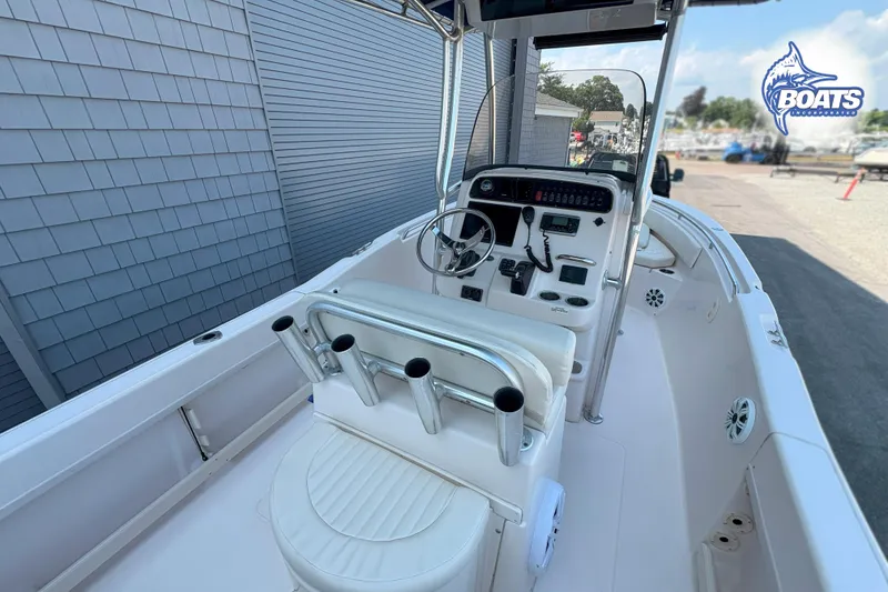 Slide: The Image of 2013 Grady-White Fisherman 209 boat interior with steering console and seating. - 8