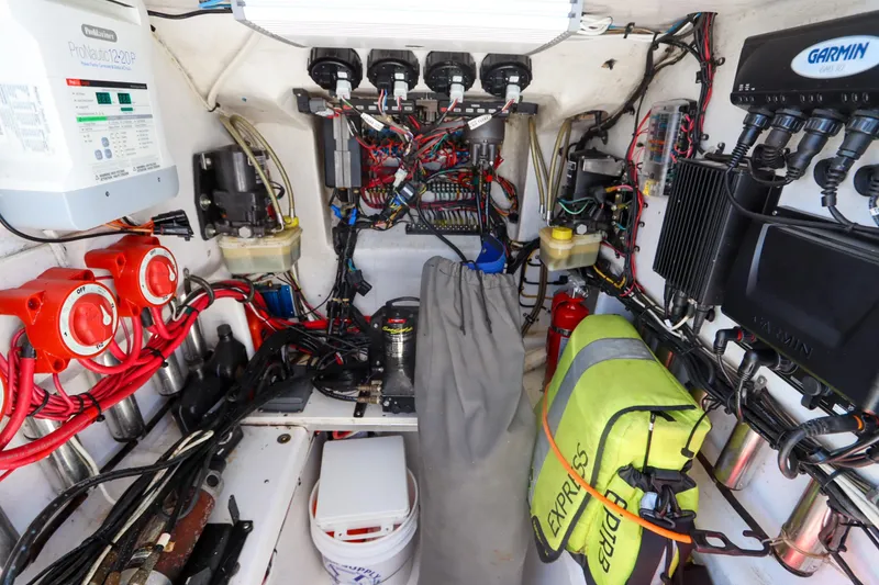 Slide: The Image of Electrical system and equipment inside a 2008 Contender 31 Tournament boat. - 31