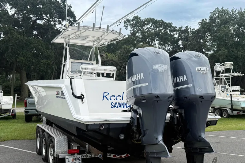 Slide: The Image of 2008 Contender 31 Tournament boat with dual Yamaha 350 engines on a trailer. - 36