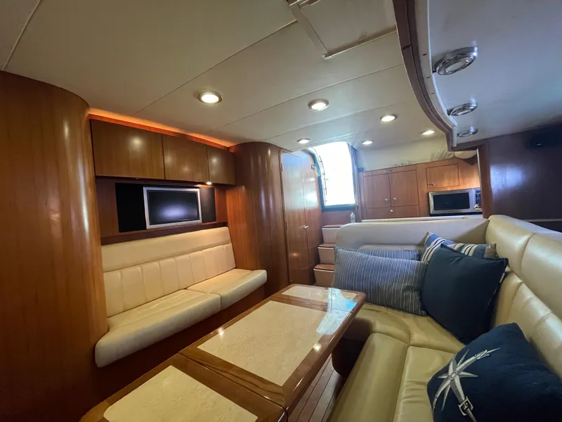 Slide: The Image of Luxurious interior of 2005 Tiara Yachts 4400 Sovran with plush seating and modern amenities. - 9