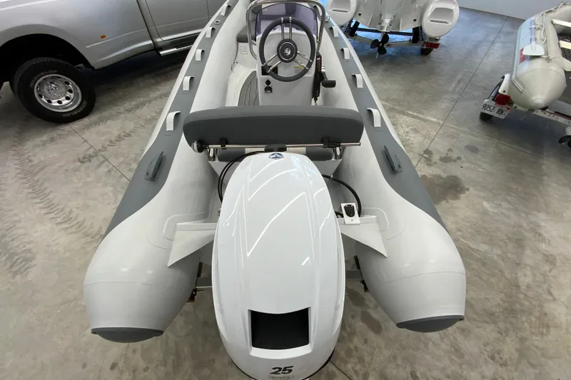 Slide: The Image of 2026 Gala A330L inflatable boat with outboard motor in showroom. - 15