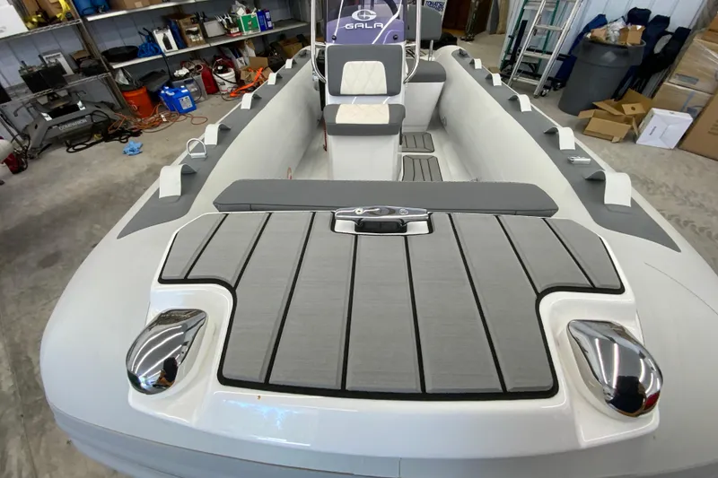 Slide: The Image of 2026 Gala A330L boat in a garage, showcasing sleek design and modern features. - 7