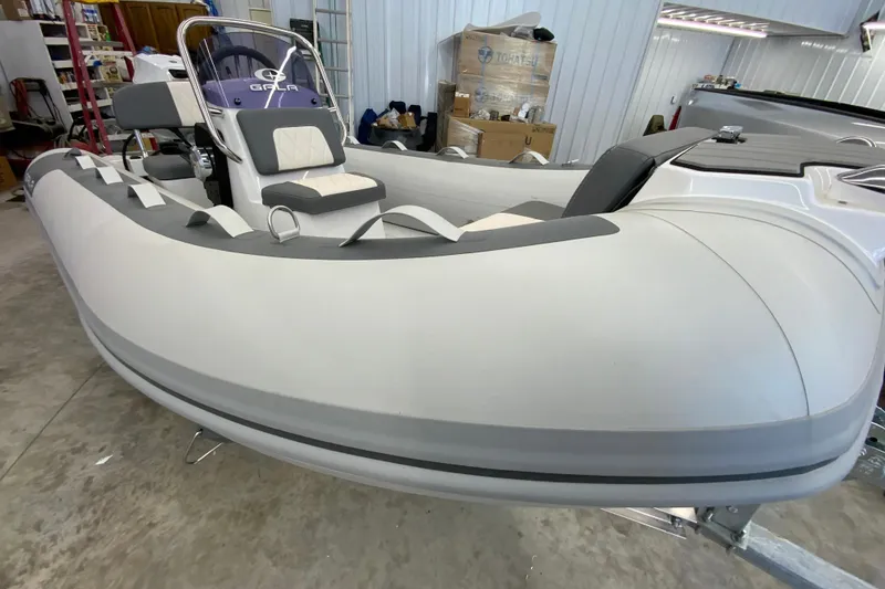 Slide: The Image of 2026 Gala A330L inflatable boat in a garage setting. - 8