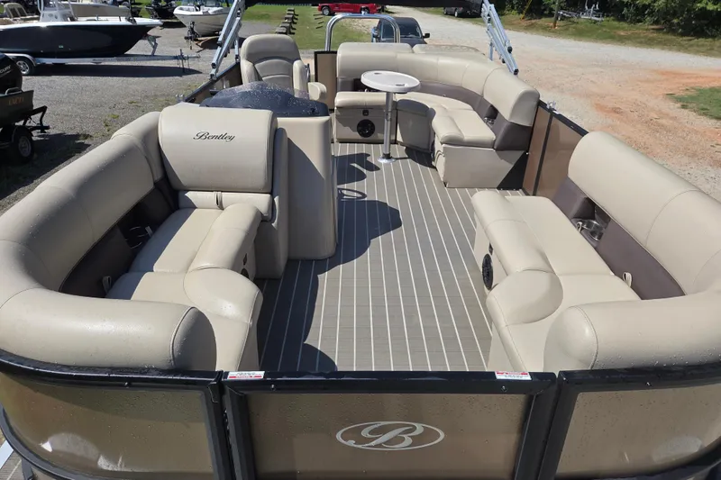 Slide: The Image of 2023 Bentley Pontoons Legacy Cruise with spacious seating and elegant design. - 14