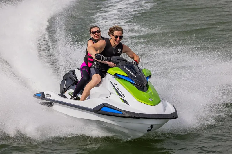 Slide: The Image of Manufacturer Provided Image: Two people enjoying a ride on a 2026 Yamaha WaveRunner VX Deluxe jet ski. - 3
