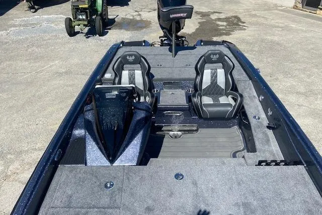 Slide: The Image of 2026 Phoenix 921 ELITE boat interior with dual seats and modern dashboard. - 3