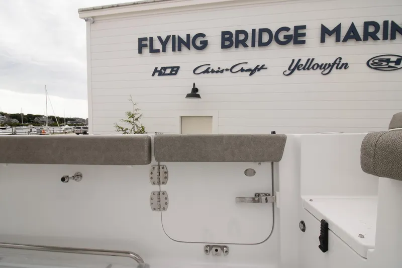 Slide: The Image of 2026 Sea Hunt Gamefish 25 at Flying Bridge Marina, featuring sleek design and comfortable seating. - 10