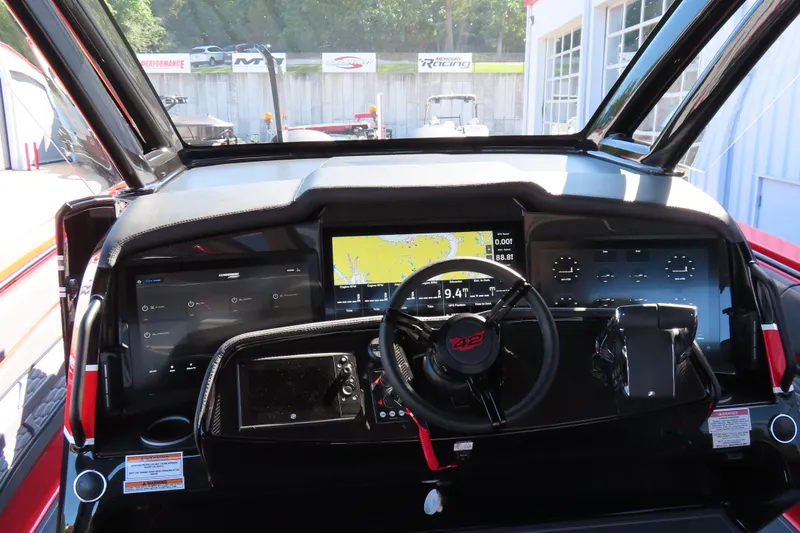 Slide: The Image of Dashboard of 2026 MTI 42 v boat with advanced navigation displays. - 16