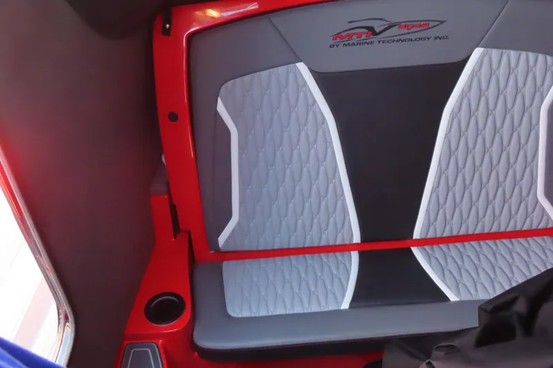Slide: The Image of Interior of 2026 MTI 42 v boat with red and gray seating design. - 18