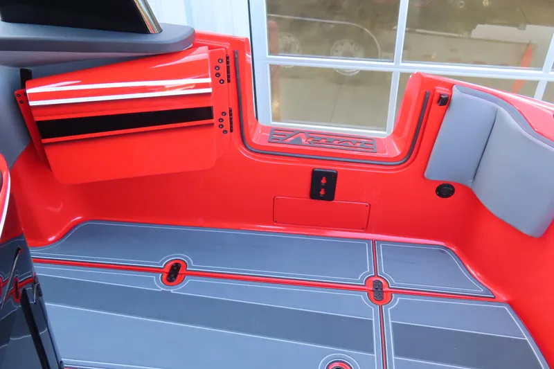 Slide: The Image of Red and gray interior of 2026 MTI 42 v boat, featuring sleek design elements. - 19