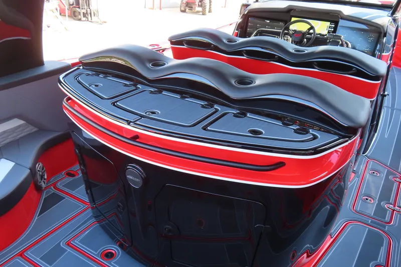 Slide: The Image of Luxury MTI 42 v boat interior, 2026 model, featuring sleek red and black design. - 20