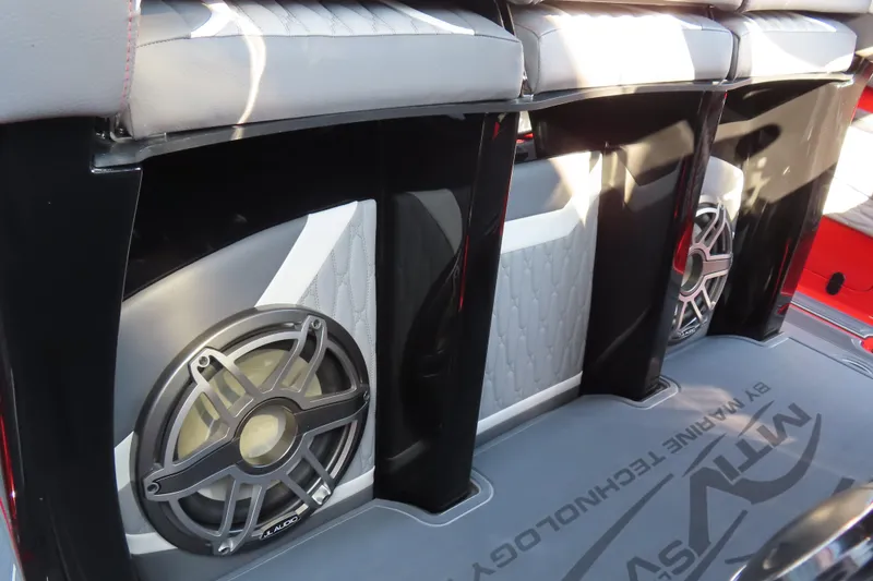 Slide: The Image of MTI 42 v 2026 boat interior with premium audio speakers and stylish seating. - 23