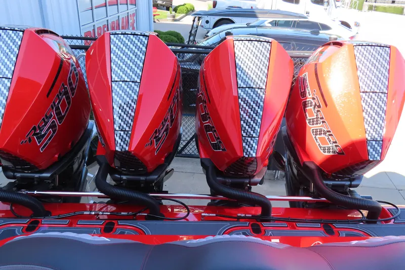 Slide: The Image of Four red racing boat engines with carbon fiber accents, MTI 42 v, 2026 model. - 7