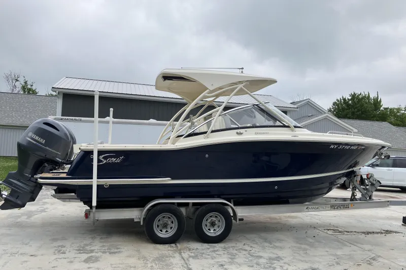 Slide: The Image of 2021 Scout 255 Dorado boat on trailer with Yamaha outboard motor. - 4